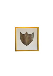 Framed Antique Metal Sign on White Linen Mat