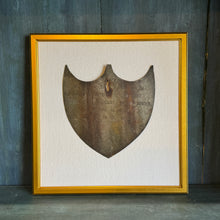 Framed Antique Metal Sign on White Linen Mat