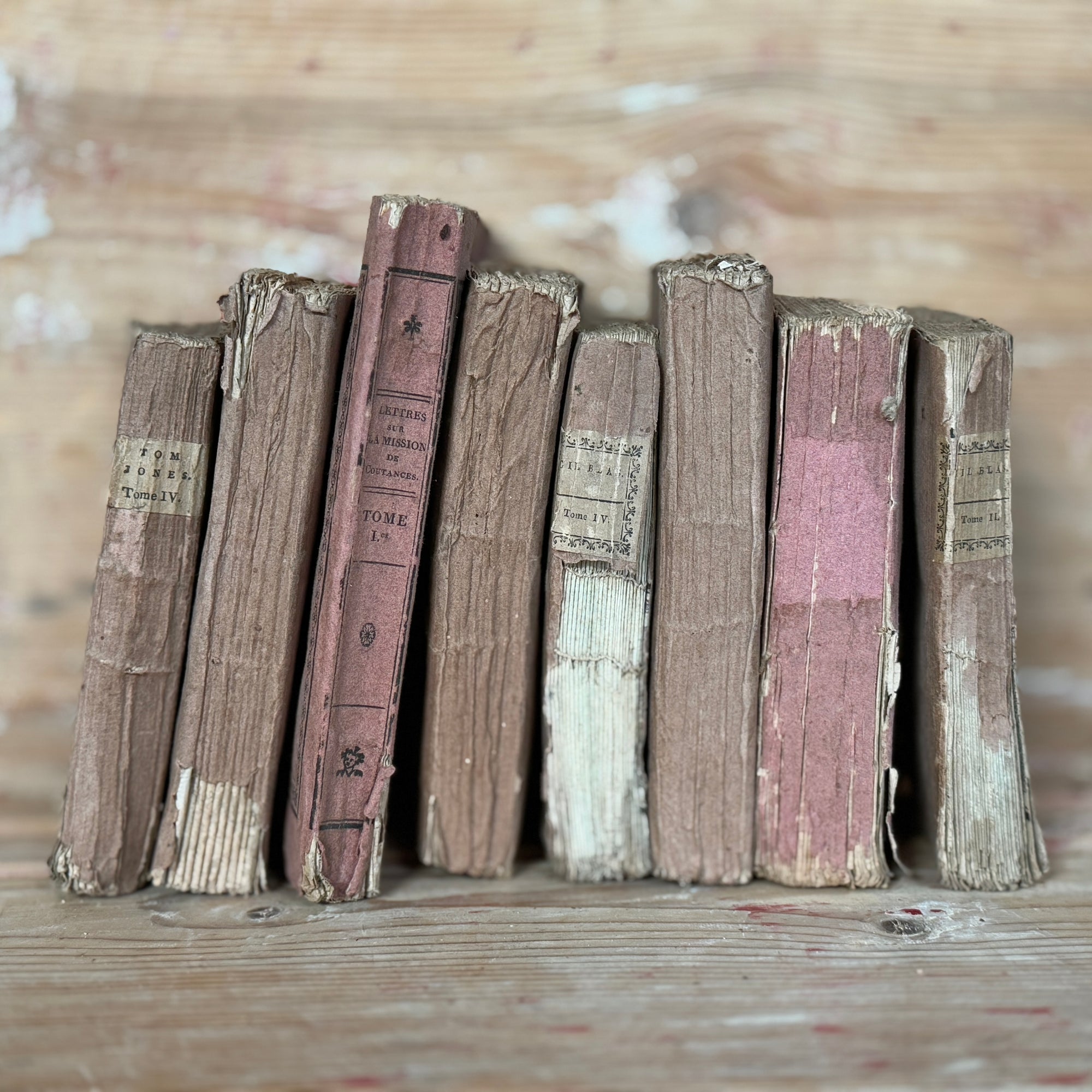 Set of 7 Antique Rose Colored Novels