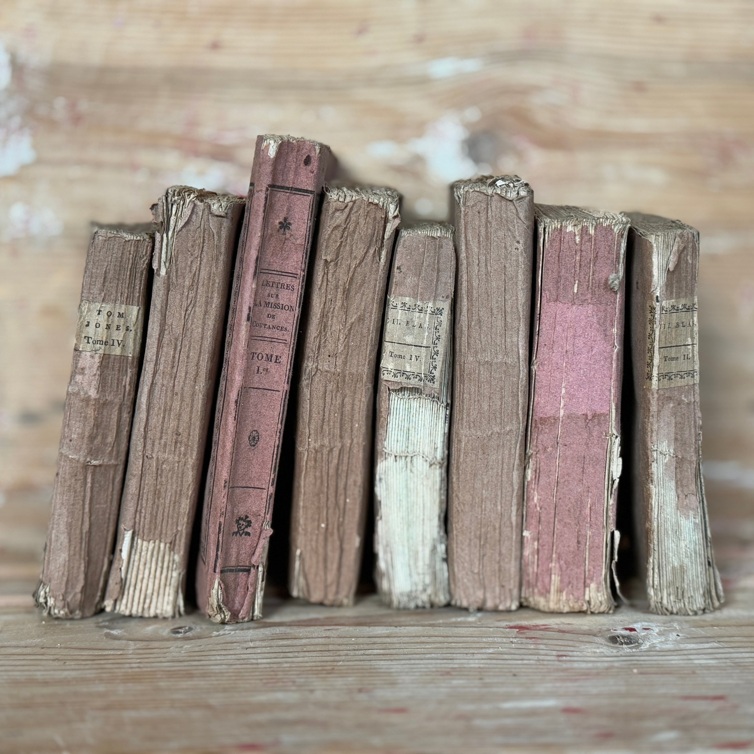 Set of 7 Antique Rose Colored Novels